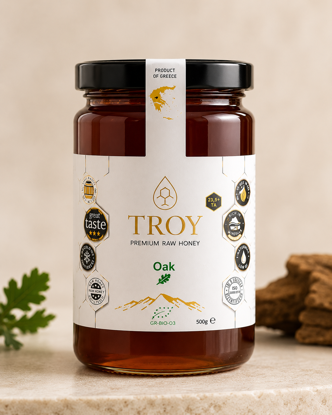 Troy Greek Raw Honey Oak Honey 500g jar on a neutral background featuring dark mineral-rich Greek honey.